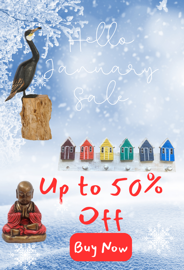 Promotional graphic with a bird figurine, small houses, and a Buddha statue on a snowy background with text about a January sale 2026.