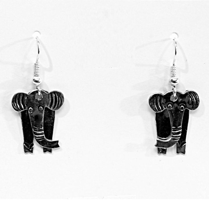 A pair of silver elephant earrings